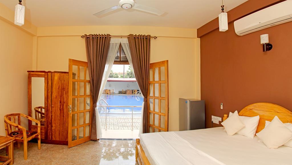 Bluewater Beach Resort ตรินโคมาลี ห้อง รูปภาพ